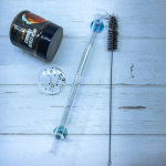 قاپی ماسی و کرێش، قاپێکی شووشەیی